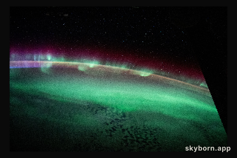 The aurora australis streams across the Earth's atmosphere as the International Space Station orbited 271 miles