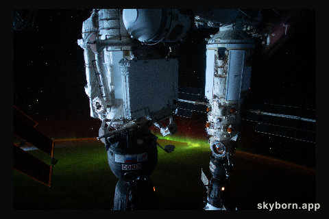 An aurora is pictured below the International Space Station as it was orbiting 274 miles above the southern Pacific