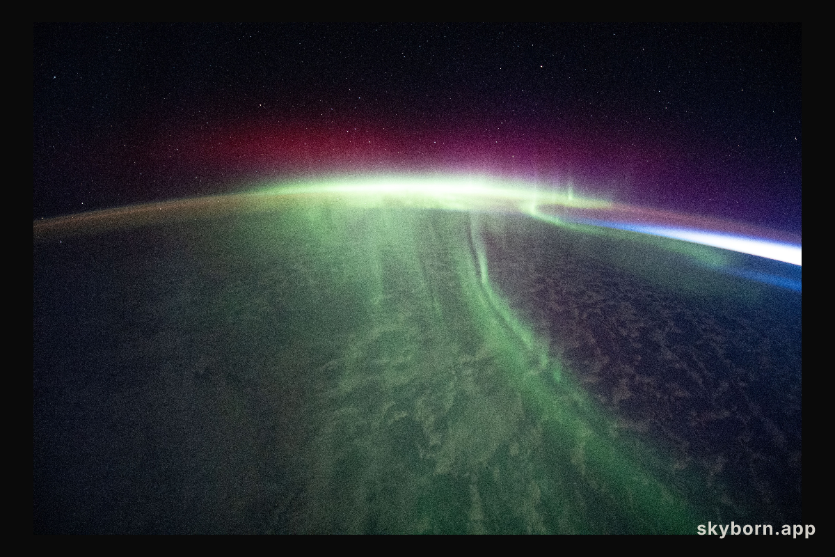 A vivid aurora streams over the Earth as the International Space Station orbited 274 miles above the southern Indian