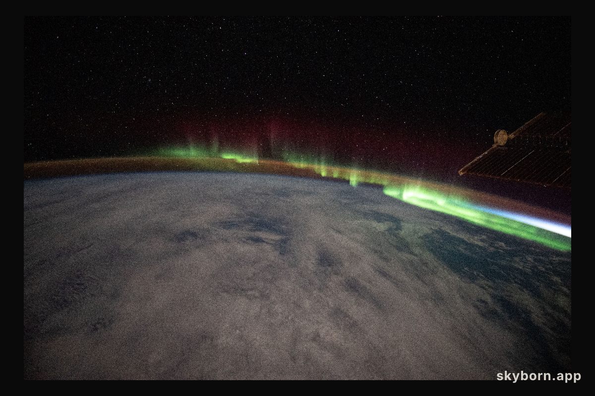 An aurora streams over the Earth as the International Space Station orbited 273 miles above the southern Indian Ocean