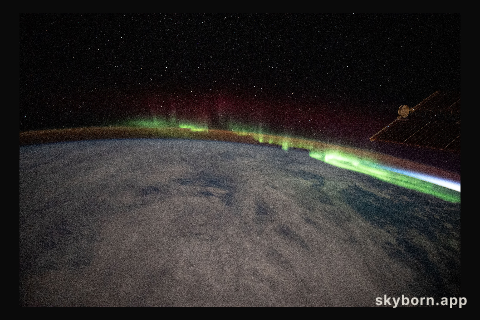 An aurora streams over the Earth as the International Space Station orbited 273 miles above the southern Indian Ocean