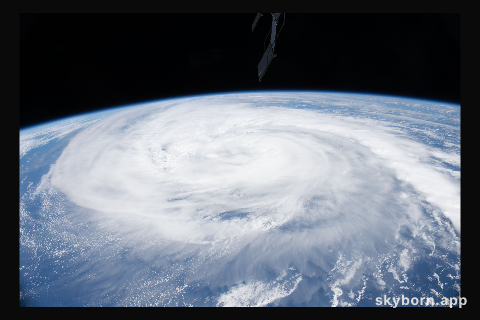 A typhoon is pictured from the International Space Station as it orbited 260 miles above the Philippine Sea in between