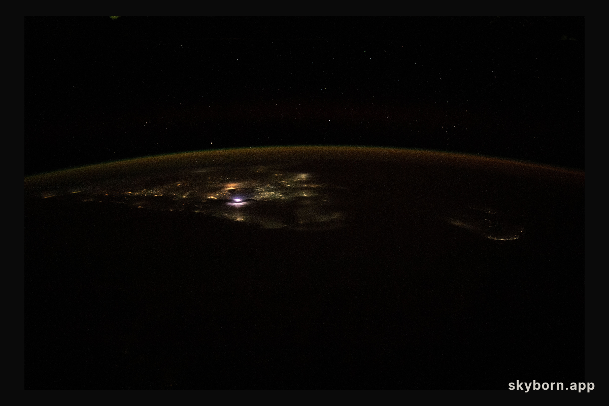 The International Space Station was orbiting 263 miles above the Indian Ocean about to cross over the city lights
