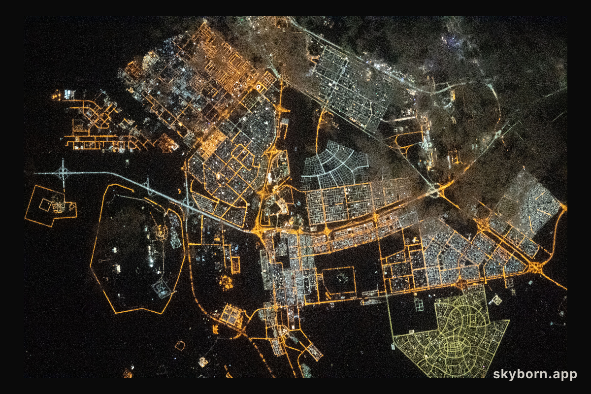 The city lights of Abu Dhabi, the capital of the United Arab Emirates, are pictured from the International Space