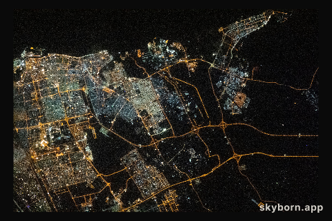 The city lights of Sharjah and Ajman are pictured during an orbital night pass as the International Space Station