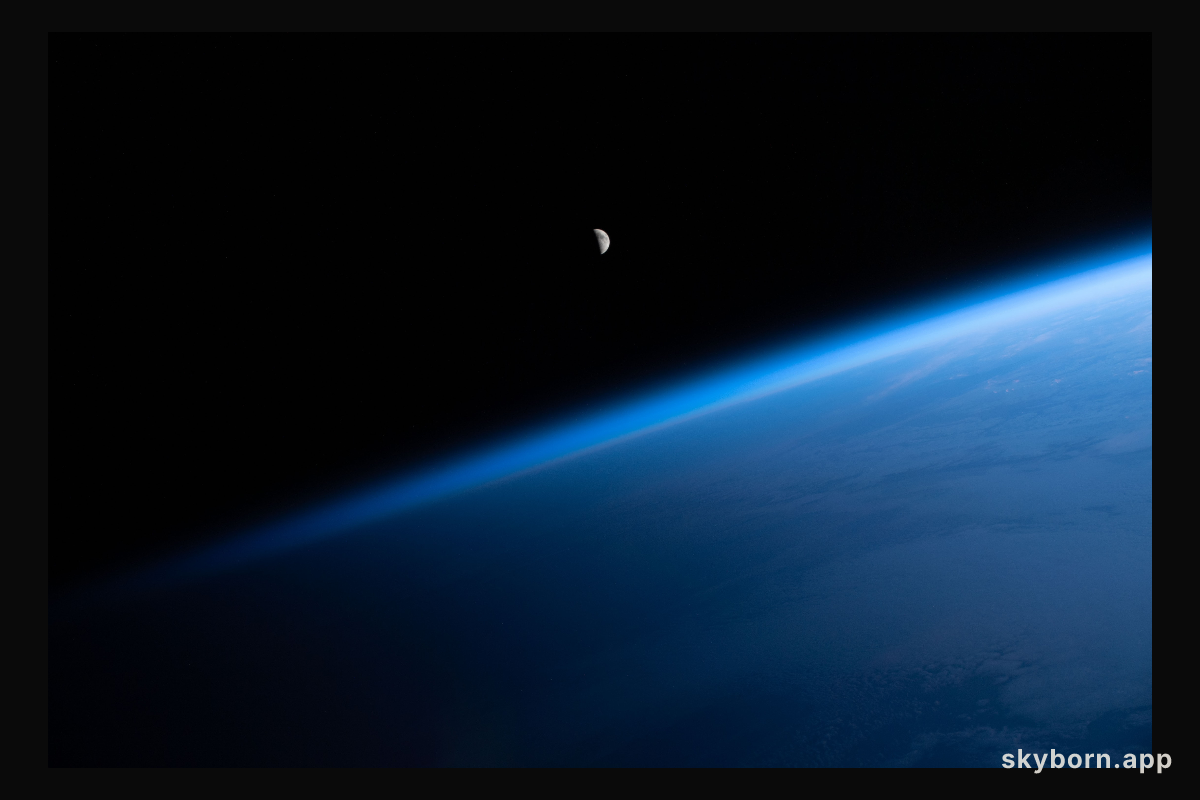 The waning crescent Moon is pictured from the International Space Station as it flew into an orbital sunrise 260 miles