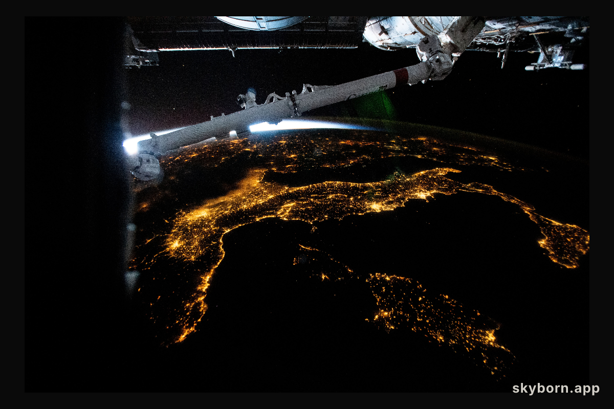 The city lights of Italy, including the French island of Corse and Italian islands of Sardinia and Sicily, are pictured