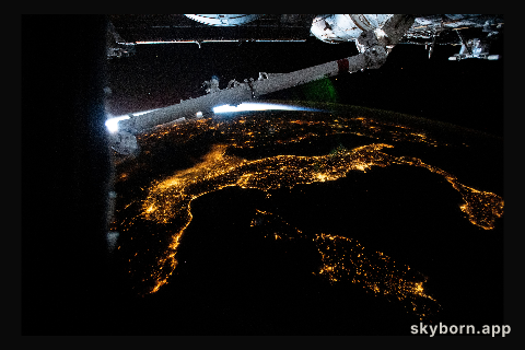 The city lights of Italy, including the French island of Corse and Italian islands of Sardinia and Sicily, are pictured