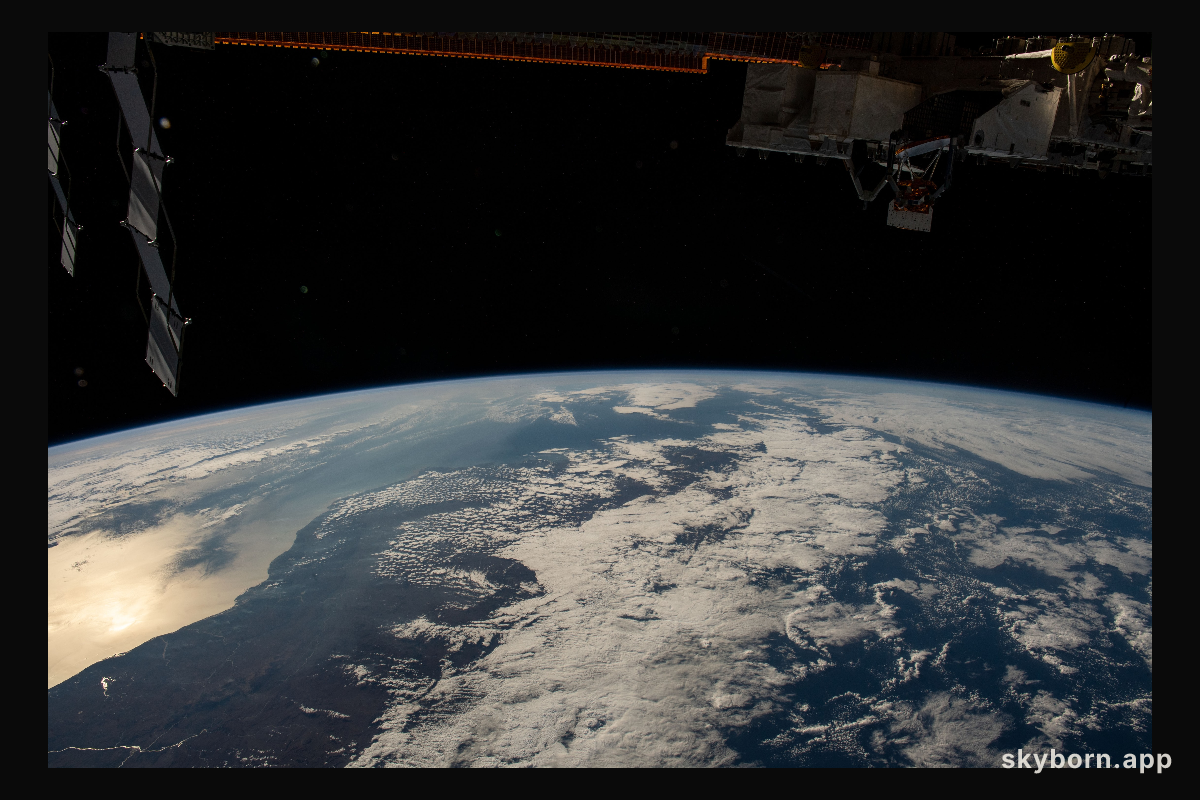 The sun's glint beams off the Mozambique Channel in this photograph of Madagascar's coast as the International Space