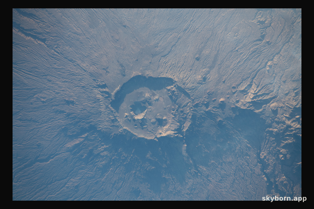 Emi Koussi, a volcano and the highest peak in the Tibesti Mountains of Chad, was photographed from the International