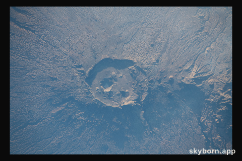 Emi Koussi, a volcano and the highest peak in the Tibesti Mountains of Chad, was photographed from the International