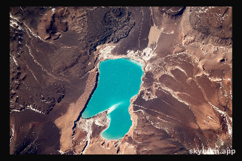 Laguna Verde, a high-altitude lake in the Andes mountains of Chile near the world's highest volcano Ojos del Salado, is