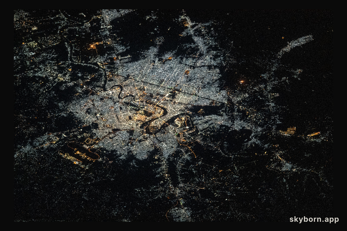 The city lights of Baghdad, Iraq, split by the Tigris River, are pictured from the International Space Station as it