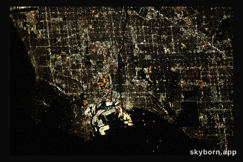 The city lights of Los Angeles, California, and its surrounding suburbs, are pictured from the International Space