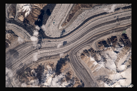 What looks like highways going through a metropolitan area are actually a series of glaciers carving their way through