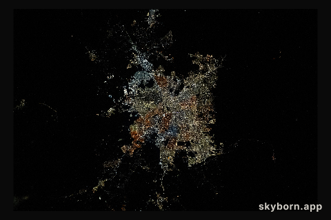 The nighttime hues of the city lights of Santiago, Chile, the South American nation's capital and largest city, are