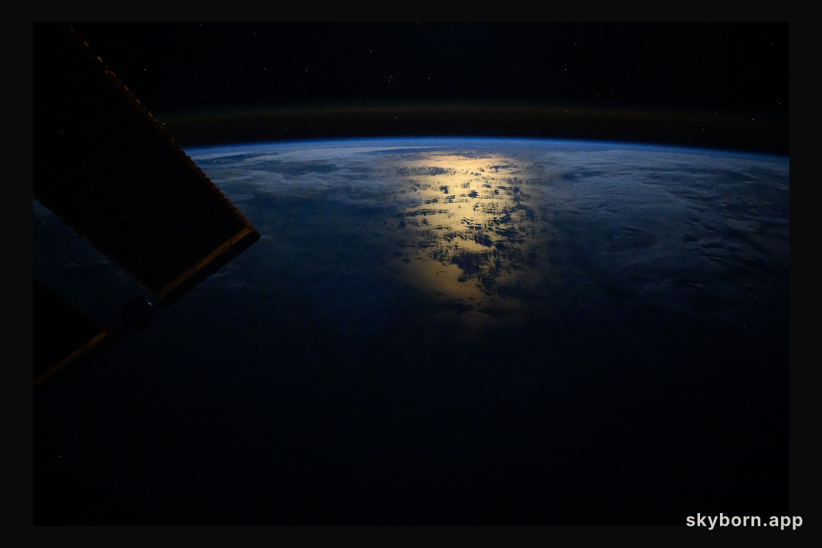 The Sun's glint beaming off the South Pacific Ocean near the coast of Chile just after an orbital sunrise and a slight