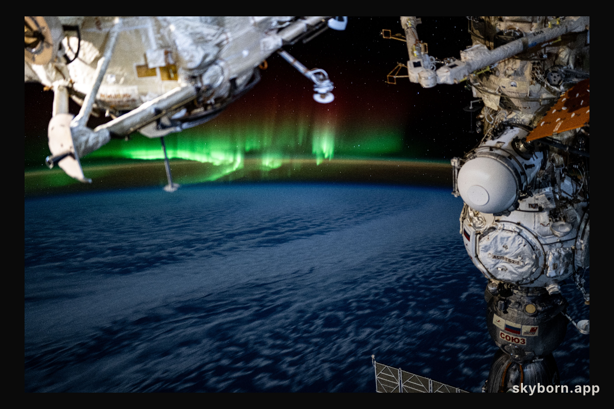 An aurora swirls above the Indian Ocean in this photograph from the International Space Station as it orbited 266 miles