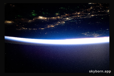 The city lights of southern Thailand and Malaysia sit in between the Malacca Strait (top) and the Gulf of Thailand