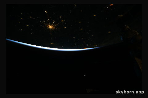 The city lights of Moscow, Russia, dotted by its surrounding suburbs, are pictured from the International Space Station