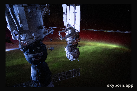 The aurora australis streams over the Earth