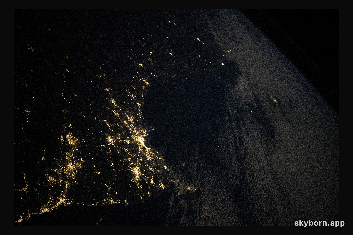The city lights along the New England coast of the United States
