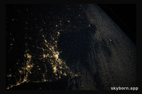 The city lights along the New England coast of the United States