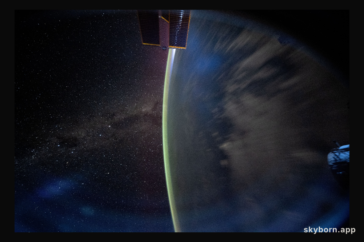 The Milky Way appears beyond Earth's horizon
