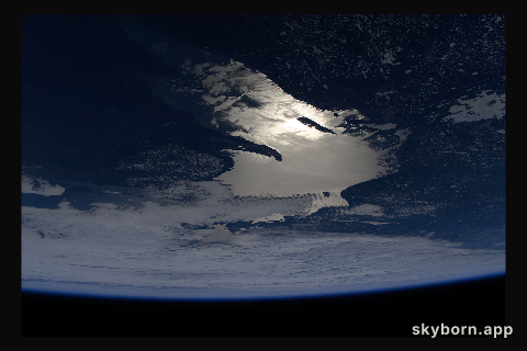 Oblique of view of the sun's glint beaming off Lake Superior