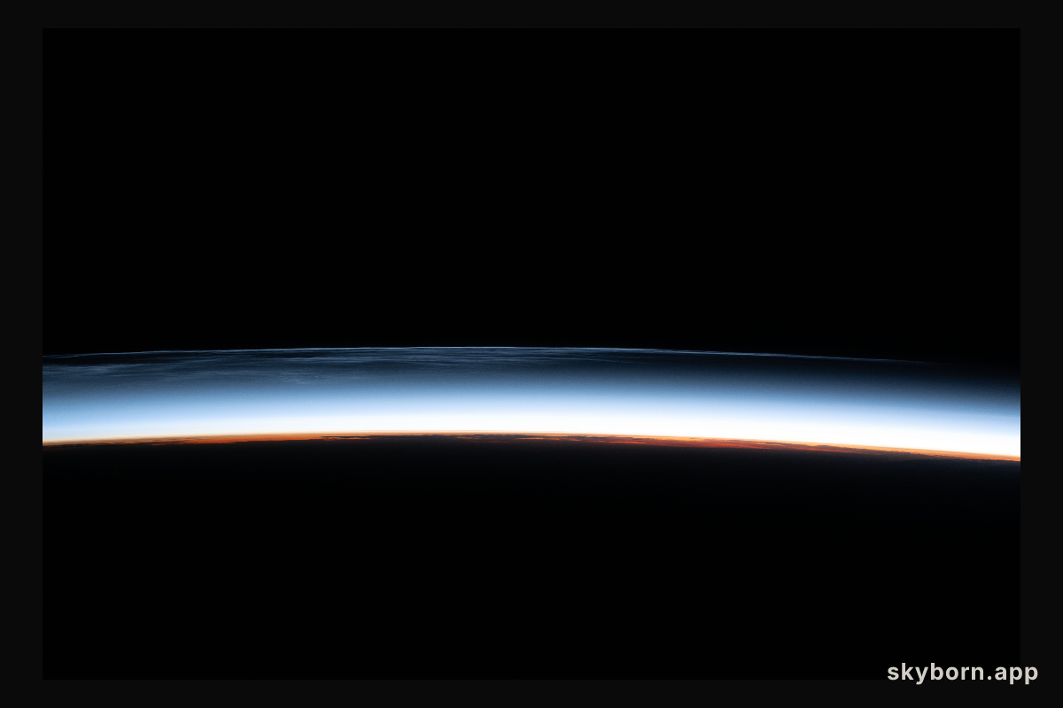 Noctilucent clouds are pictured above the North Pacific Ocean