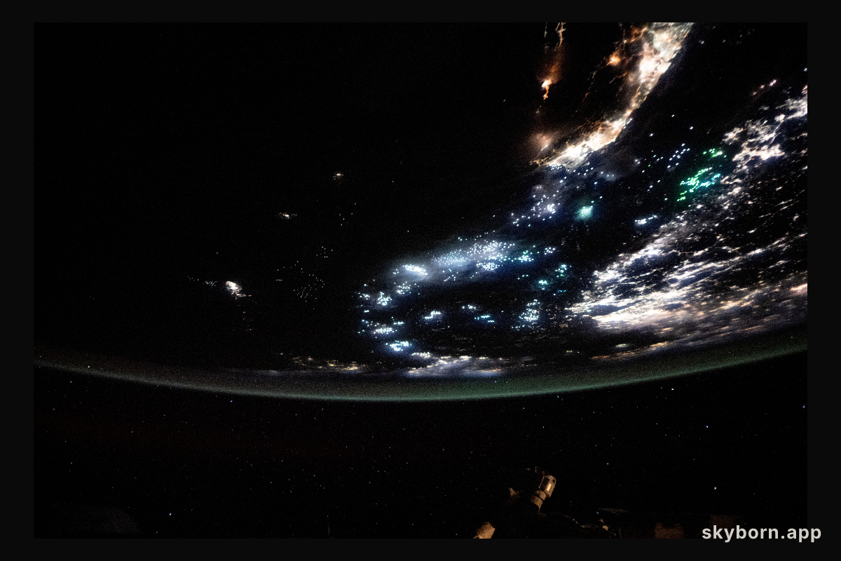 The blue-green lights of fishing boats dot the East China Sea and the Taiwan Strait