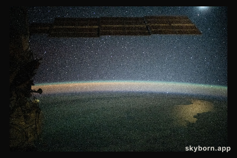 Serene image of the Moon glinting off the Southern Pacific Ocean