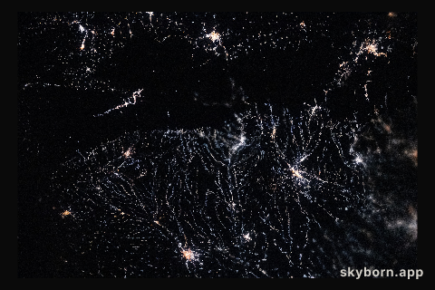 City lights trace river valleys in the Wallachian Plain of Romania