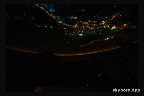 The blue and green lights of fishing boats dot the Gulf of Thailand and the Andaman Sea